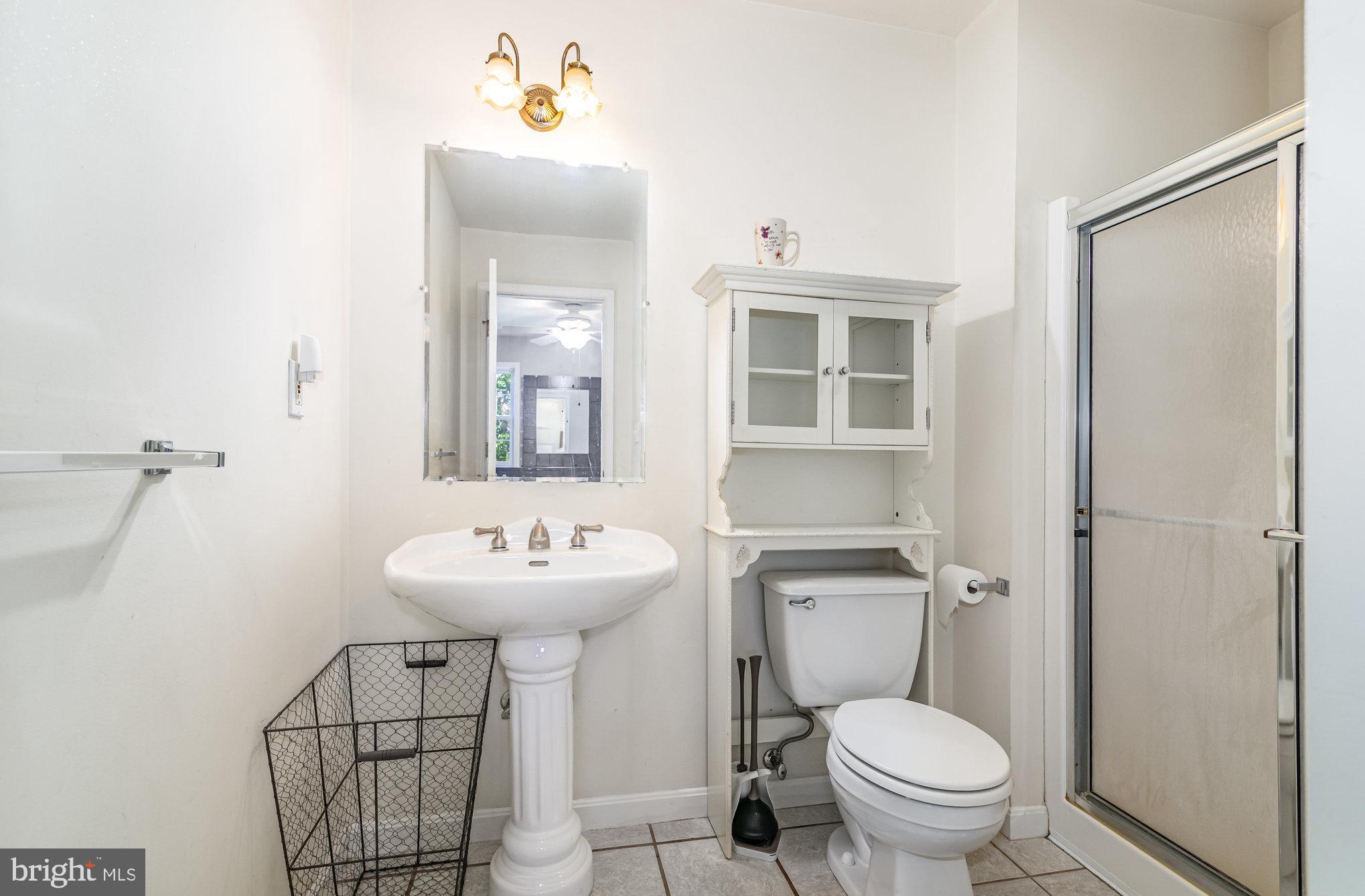 7 Beverly Court Carlisle, PA 17015 - Photo 15 of 25 Bright and airy bathroom with modern fixtures.