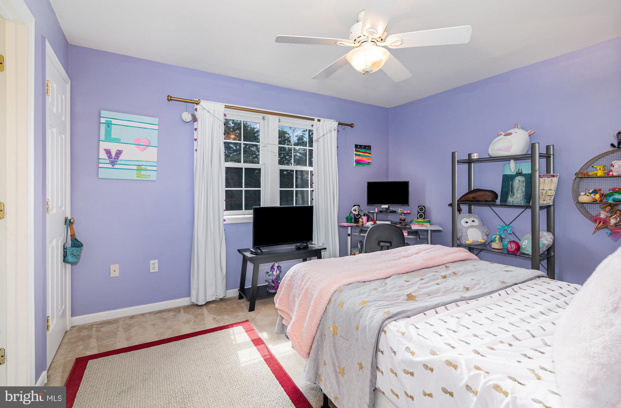 7 Beverly Court Carlisle, PA 17015 - Photo 16 of 25 Charming purple-hued bedroom retreat.