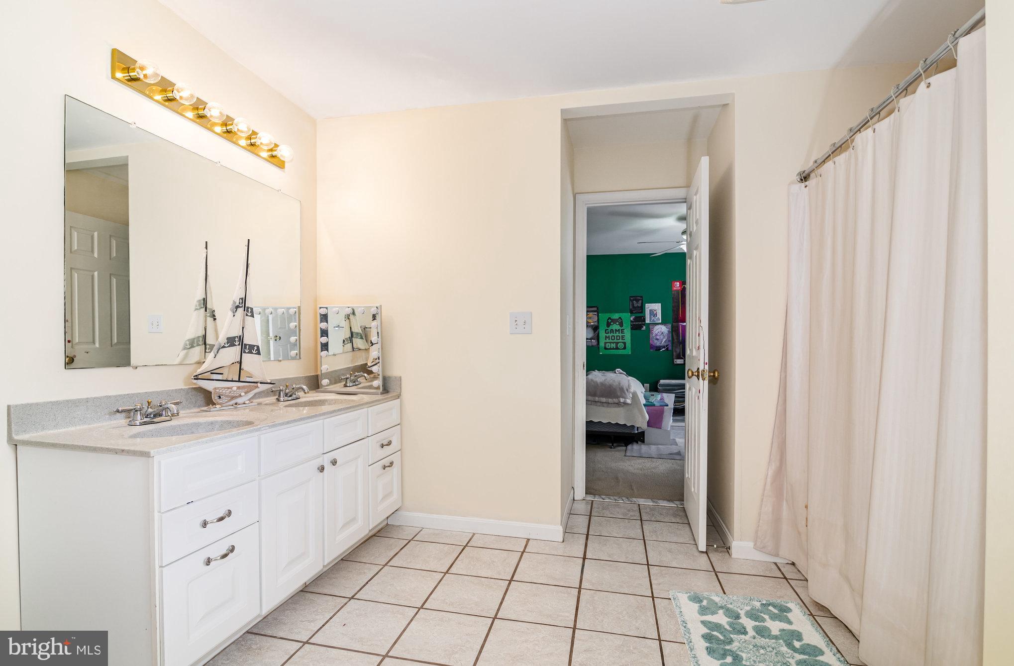 7 Beverly Court Carlisle, PA 17015 - Photo 17 of 25 Bright and airy bathroom with modern touches.
