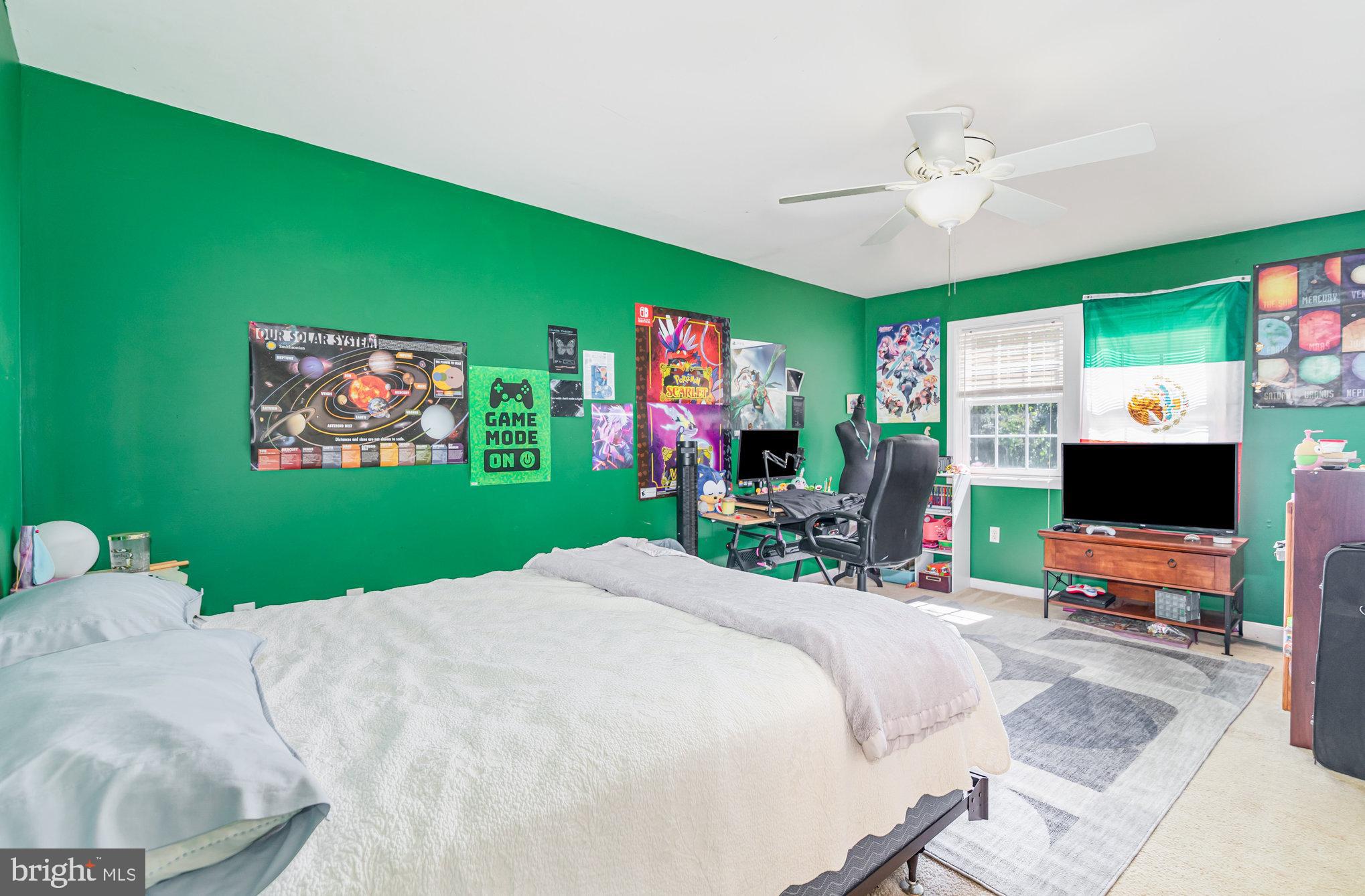 7 Beverly Court Carlisle, PA 17015 - Photo 18 of 25 Vibrant gaming retreat with bold green walls.