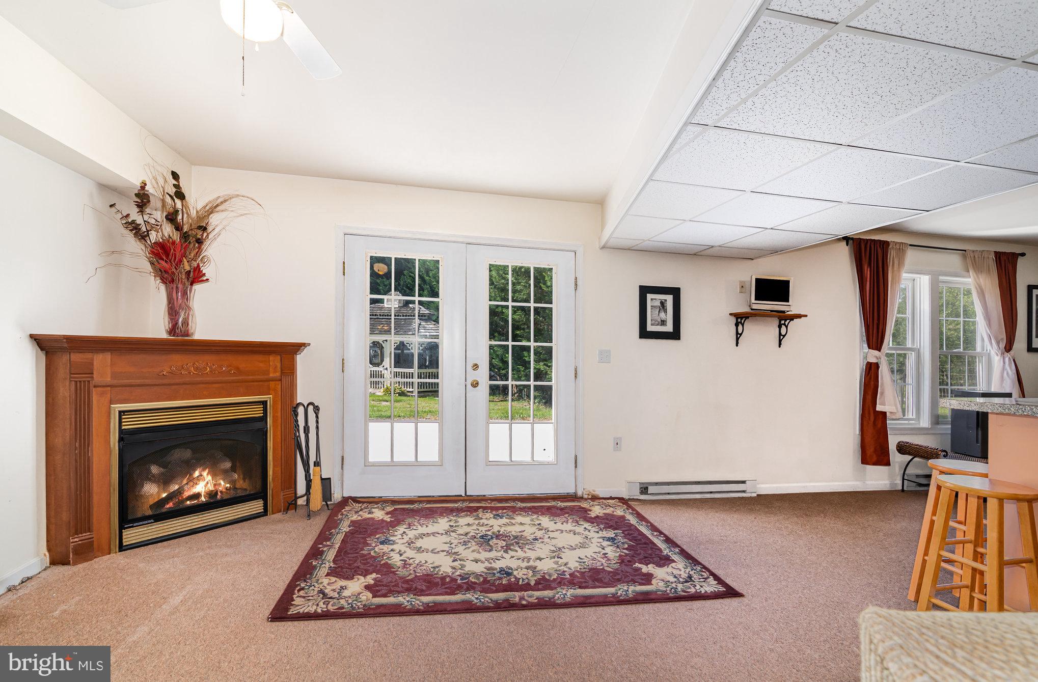 7 Beverly Court Carlisle, PA 17015 - Photo 19 of 25 Cozy living space with inviting fireplace.