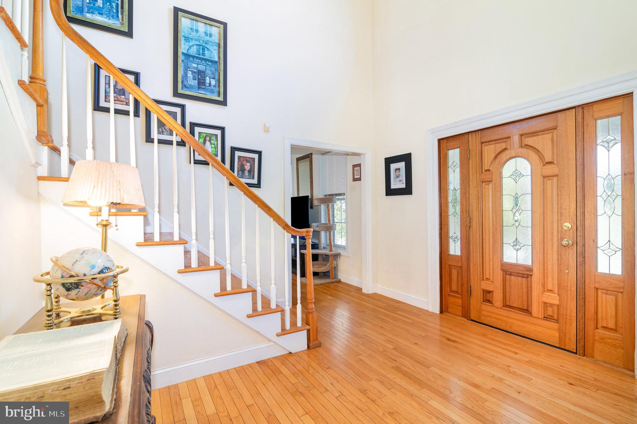 7 Beverly Court Carlisle, PA 17015 - Photo 3 of 25 Inviting foyer with elegant staircase charm.