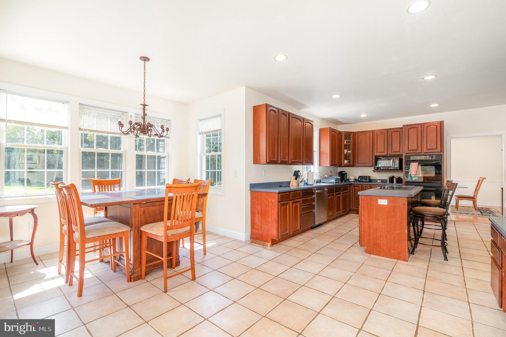 7 Beverly Court Carlisle, PA 17015 - Photo 4 of 25 Bright and inviting kitchen with warm tones.