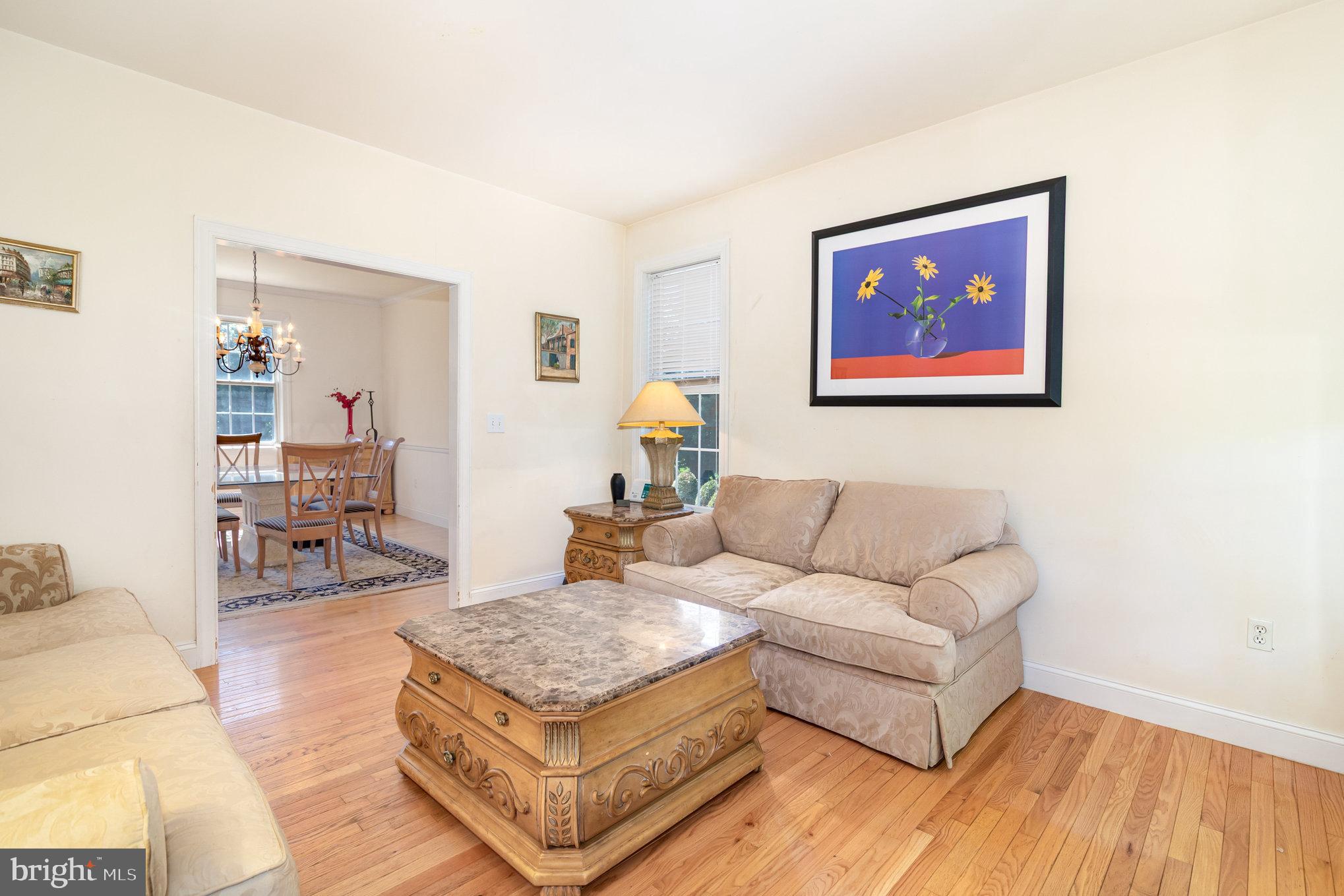 7 Beverly Court Carlisle, PA 17015 - Photo 6 of 25 Bright and inviting living space with art.