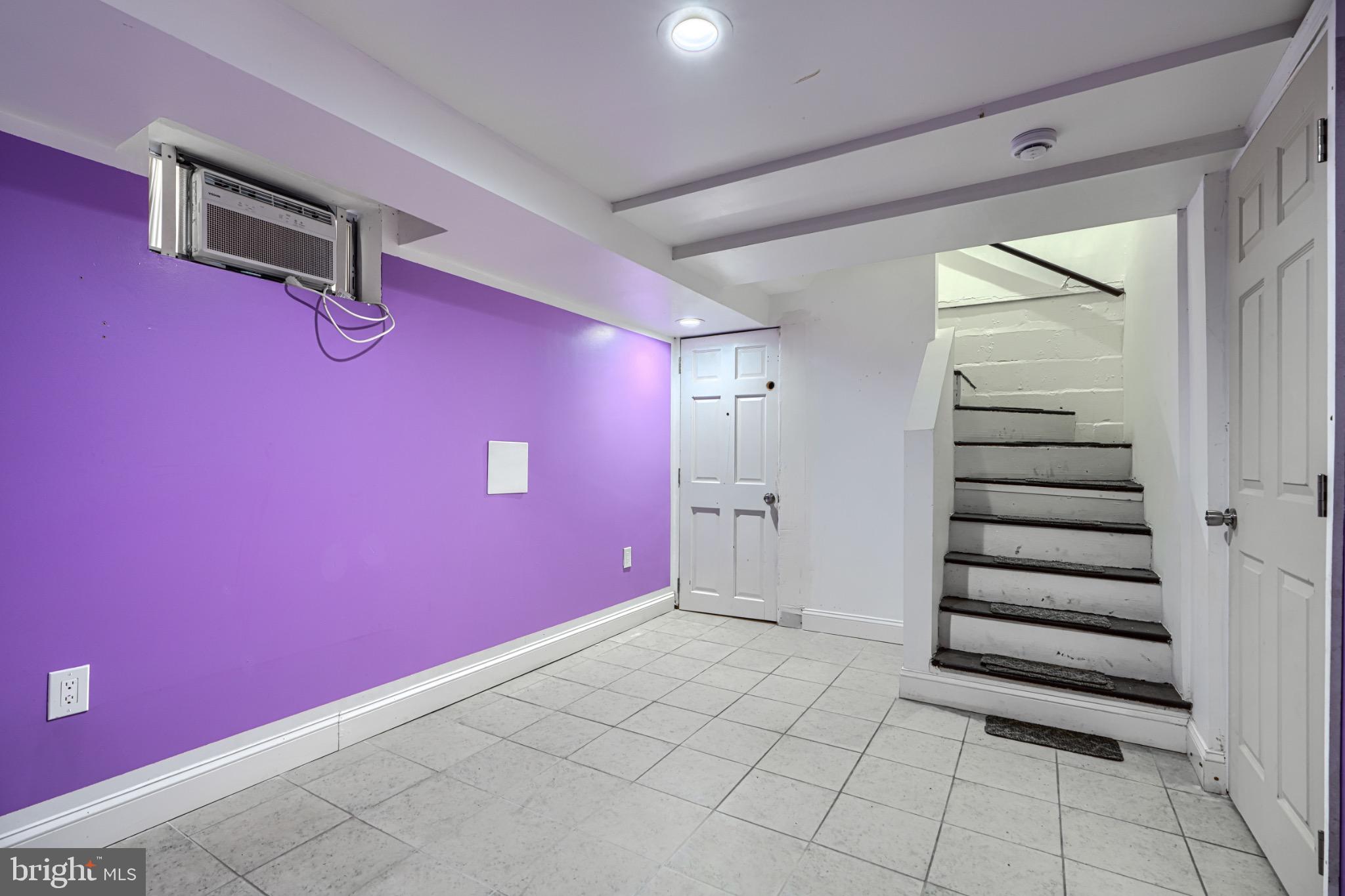 804 Quail Street Baltimore, MD 21224 - Photo 20 of 39 a view of a livingroom with stairs