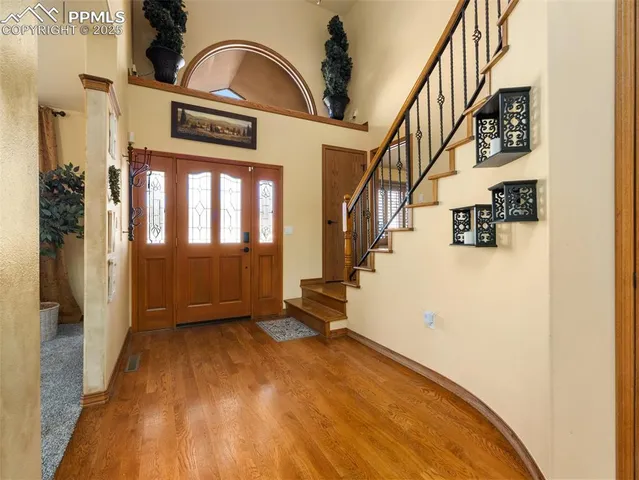 a view of a hallway with entryway