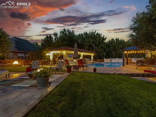 a view of a park with seating space