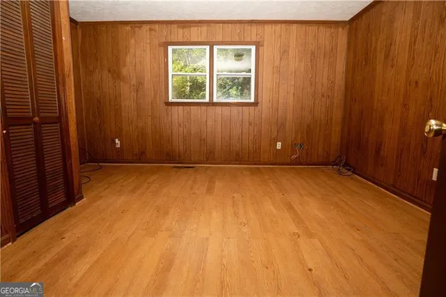 an empty room with windows