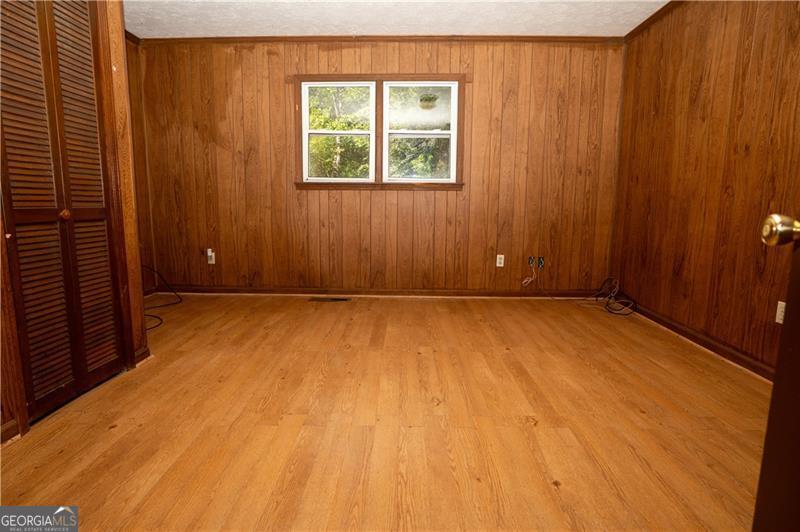 305 Wolfe Street Dublin, GA 31021 - Photo 17 of 27 an empty room with windows