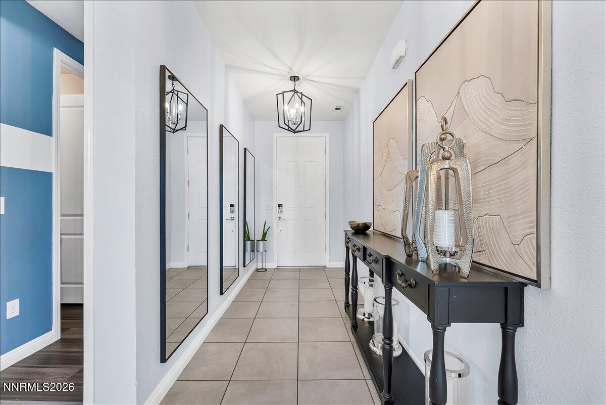 2139 Roaring Fork Court Sparks, NV 89436 - Photo 2 of 42 a view of a hallway with elevator