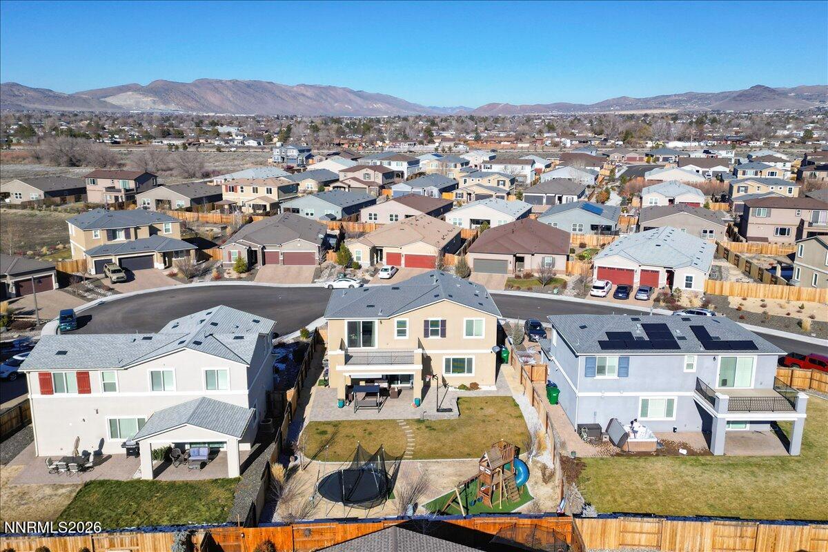 2139 Roaring Fork Court Sparks, NV 89436 - Photo 36 of 42 an aerial view of residential houses with outdoor space and trees