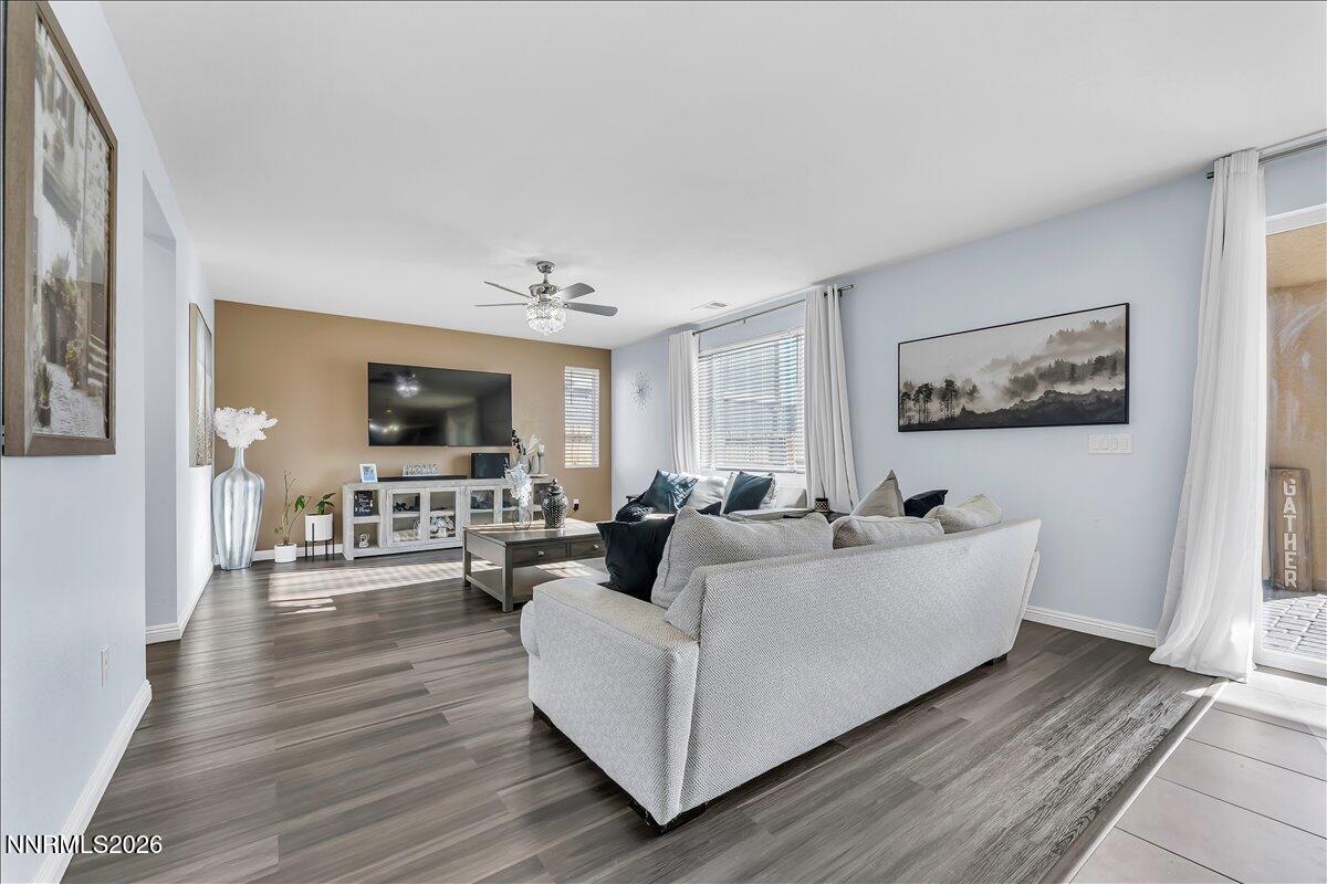2139 Roaring Fork Court Sparks, NV 89436 - Photo 4 of 42 a living room with furniture and a flat screen tv