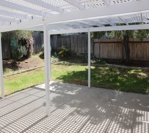 1451 Brook Road San Marcos, CA 92069 - Photo 2 of 24 View of back yard from the 24'x20' shaded patio area. Private fenced back yard.