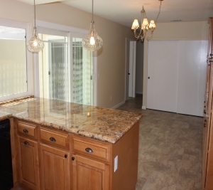 1451 Brook Road San Marcos, CA 92069 - Photo 5 of 24 Large dining room area open to kitchen and breakfast bar and with slider to the back yard and patio.