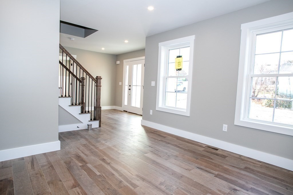 38 D Edson Road Oakham, MA 01068 - Photo 21 of 36 a view of an entryway with wooden floor and windows