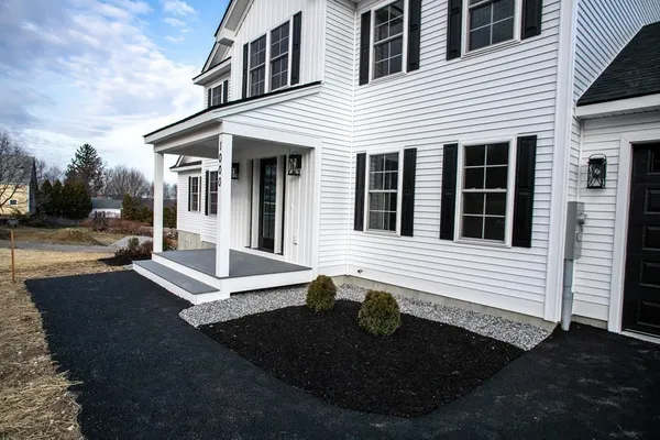a front view of a house with entertaining space