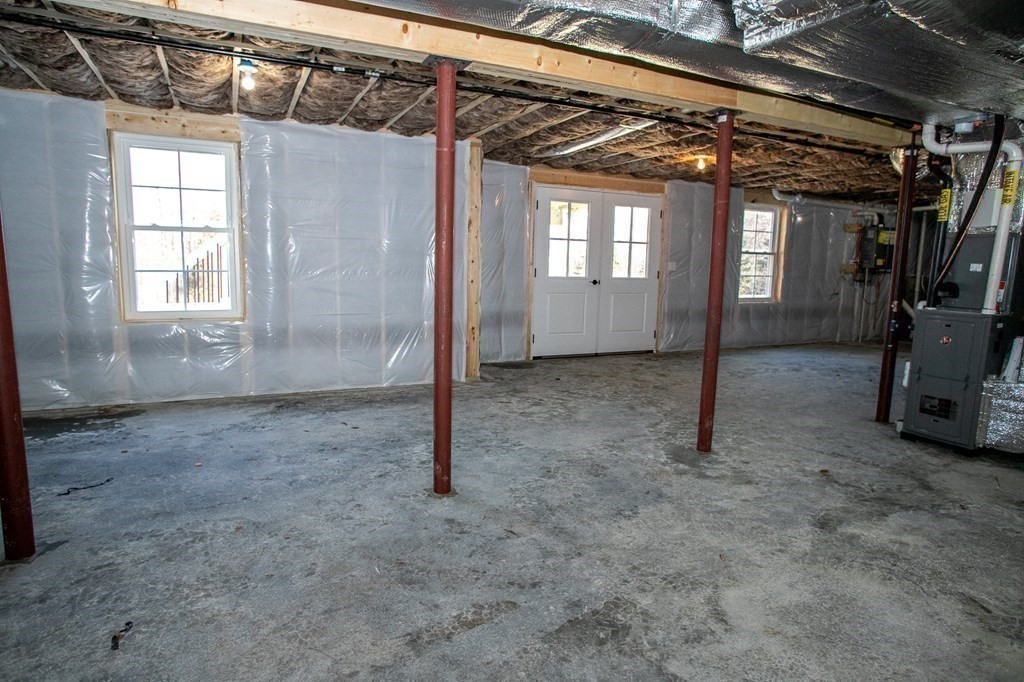 38 D Edson Road Oakham, MA 01068 - Photo 36 of 36 a view of an empty room with windows