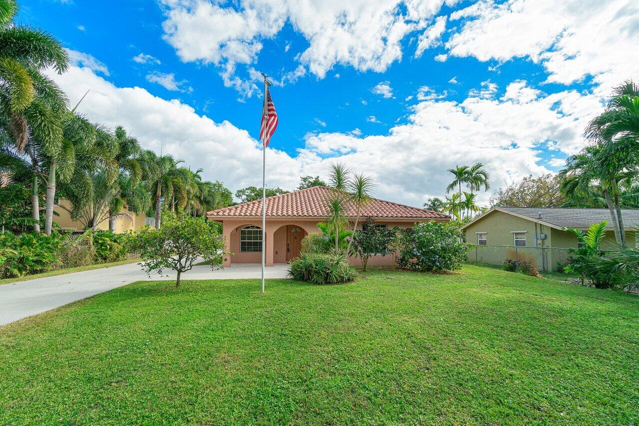 5592 1st Road Lake Worth, FL 33467 - Photo 1 of 22 001-55921stRoad-LakeWorth-FL-33467-SMALL