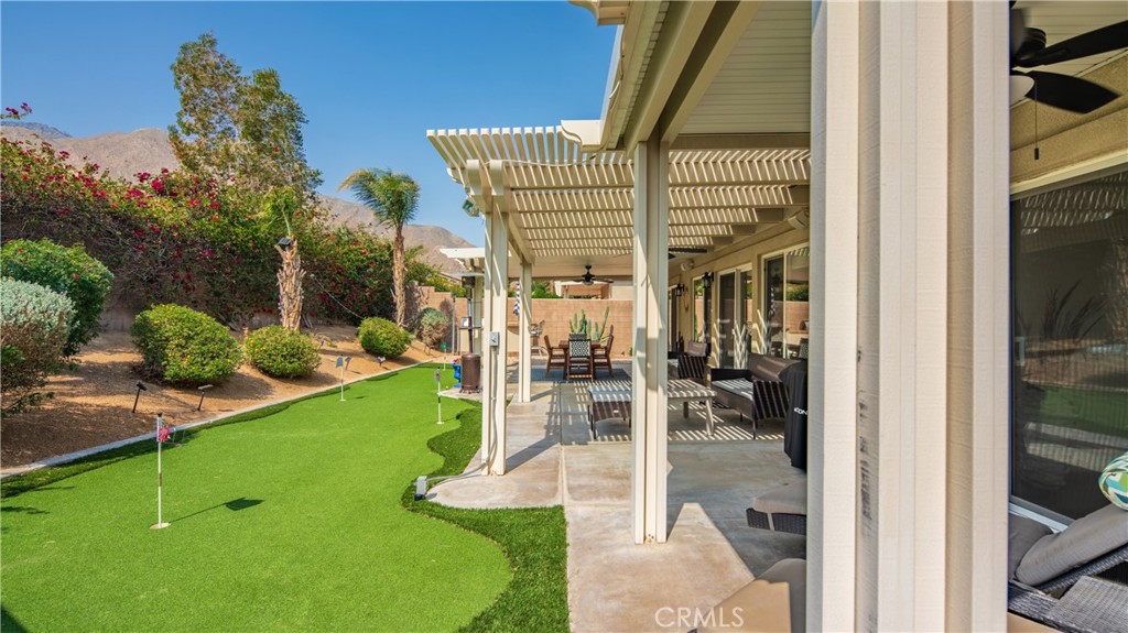 1171 Palmas Ridge Palm Springs, CA 92262 - Photo 18 of 75 Your private putting green makes golf practice easy and care free! Gorgeous mountains in the view!
