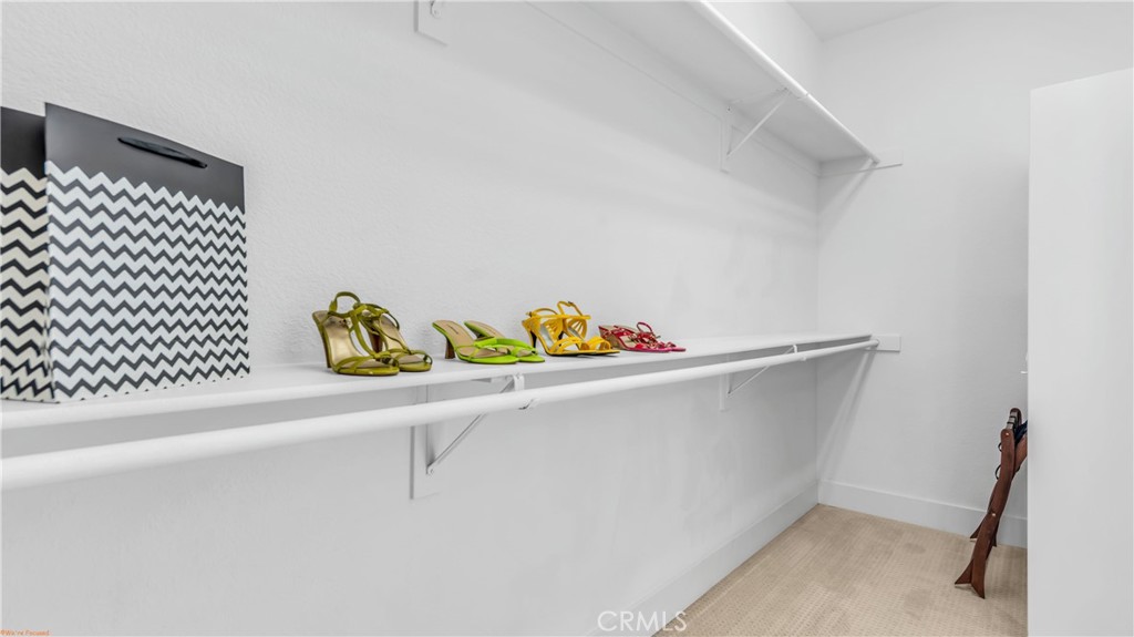 1171 Palmas Ridge Palm Springs, CA 92262 - Photo 28 of 75 Large walk in closet in the Primary. Walk in closets in all bedrooms in the main house!!