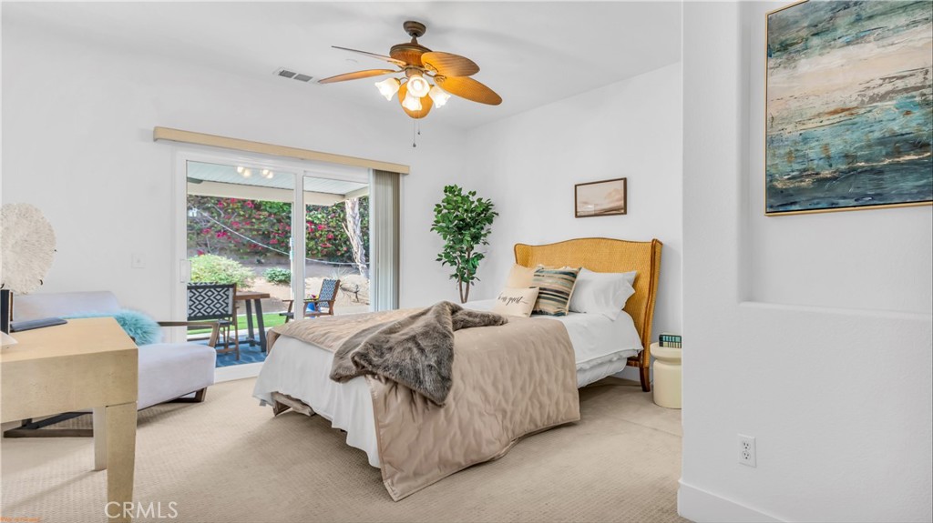 1171 Palmas Ridge Palm Springs, CA 92262 - Photo 29 of 75 Guest bedroom with lovely garden view and large sliding doors to exterior for fresh air!