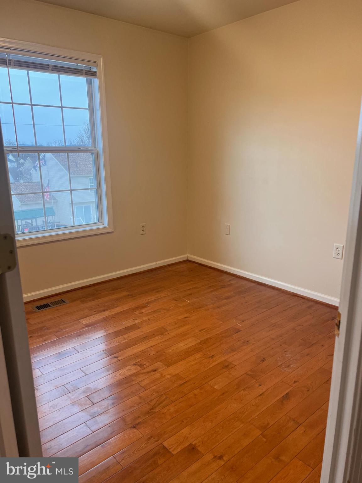 121 North Marshall Street Ranson, WV 25438 - Photo 13 of 17 wooden floor in an empty room
