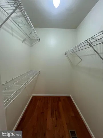 a view of a room with racks on the wall