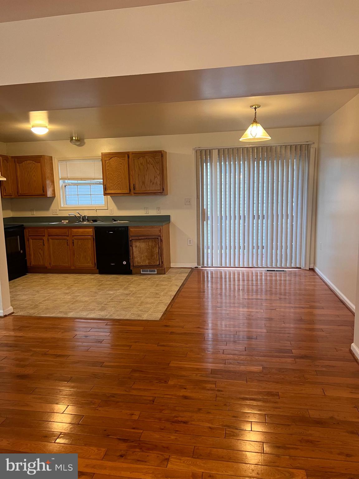 121 North Marshall Street Ranson, WV 25438 - Photo 9 of 17 a view of kitchen with wooden floor
