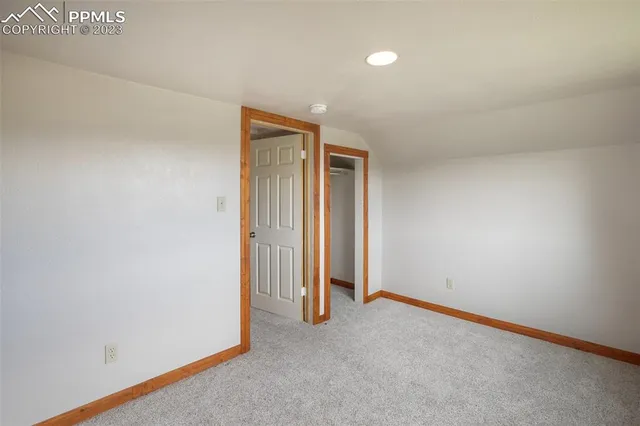 an empty room with closet