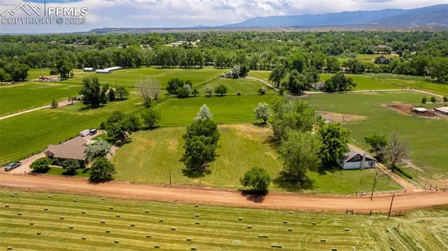 a view of a city with mountains in the background