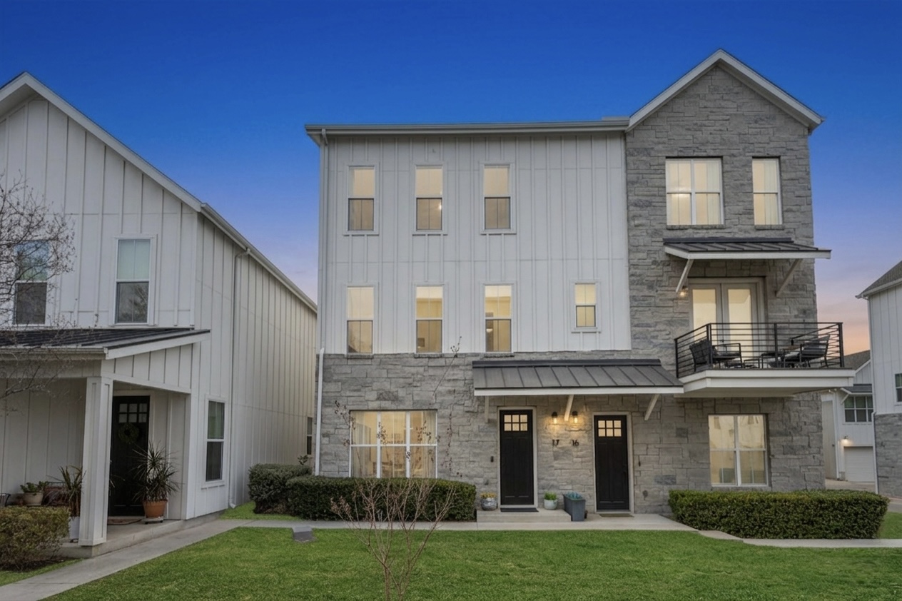 2624 Metcalfe Road, Unit 17 Austin, TX 78741 - Photo 2 of 35 a front view of a house with a yard