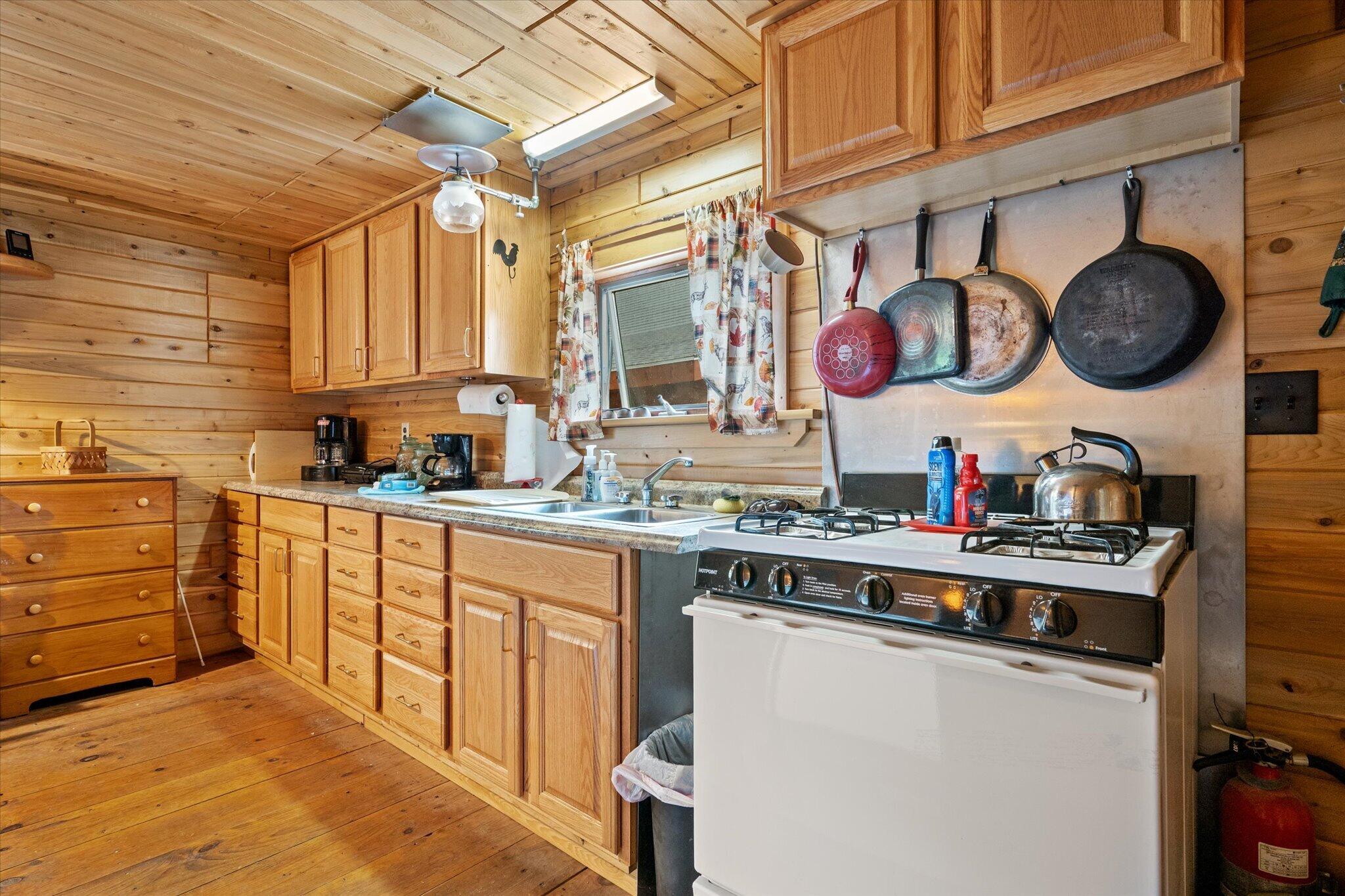 314 Atwood Pond Road Patten, ME 04765 - Photo 42 of 76 Kitchen Area-Bunkhouse...