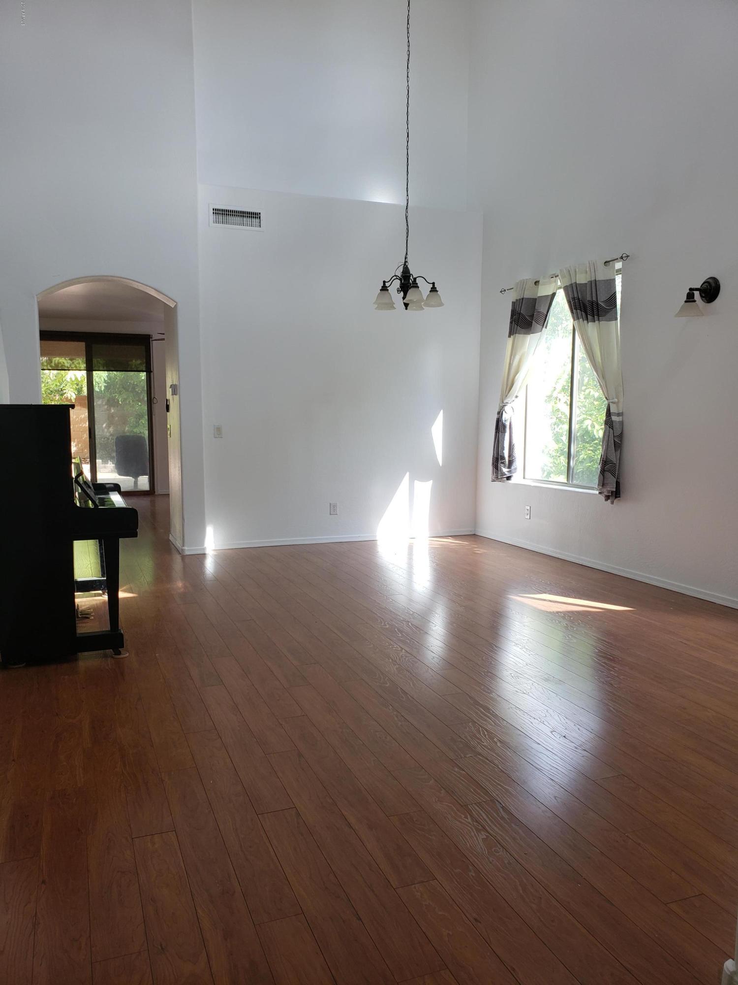 14152 West Calavar Road Surprise, AZ 85379 - Photo 2 of 26 Living Room