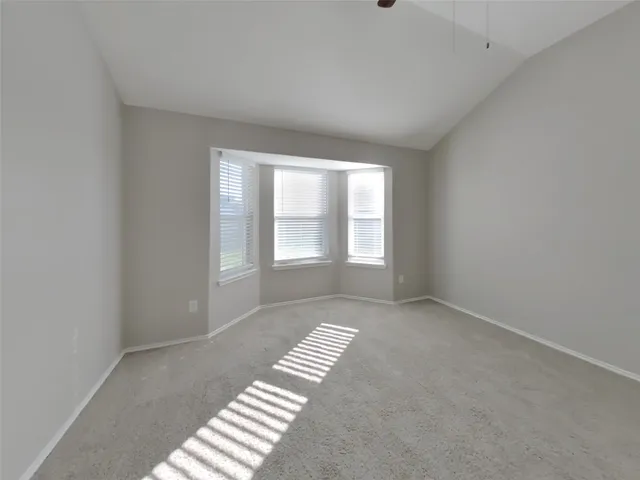 a view of a room with windows