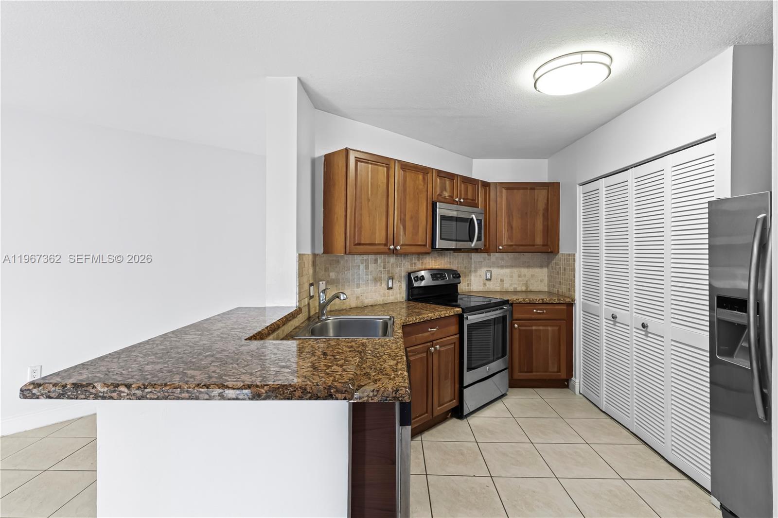 6292 Northwest 186th Street, Unit 301 Hialeah, FL 33015 - Photo 6 of 18