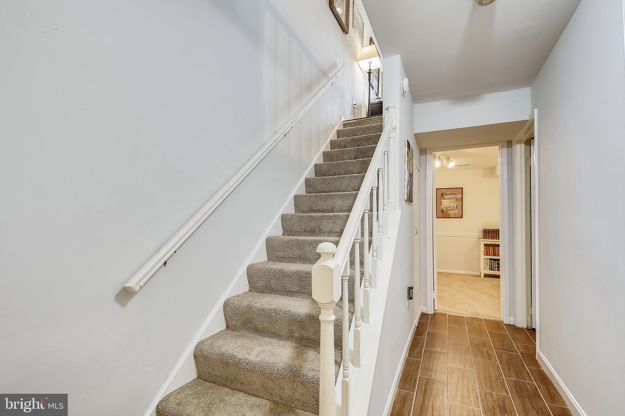 2066 Derby Ridge Lane, Unit 318 Silver Spring, MD 20910 - Photo 19 of 29 Stairway from lower level to main level