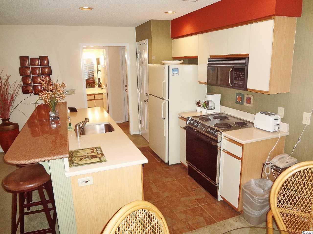 219 Clubhouse Road, Unit 405 Sunset Beach, NC 28468 - Photo 8 of 25 Gallery Image 8