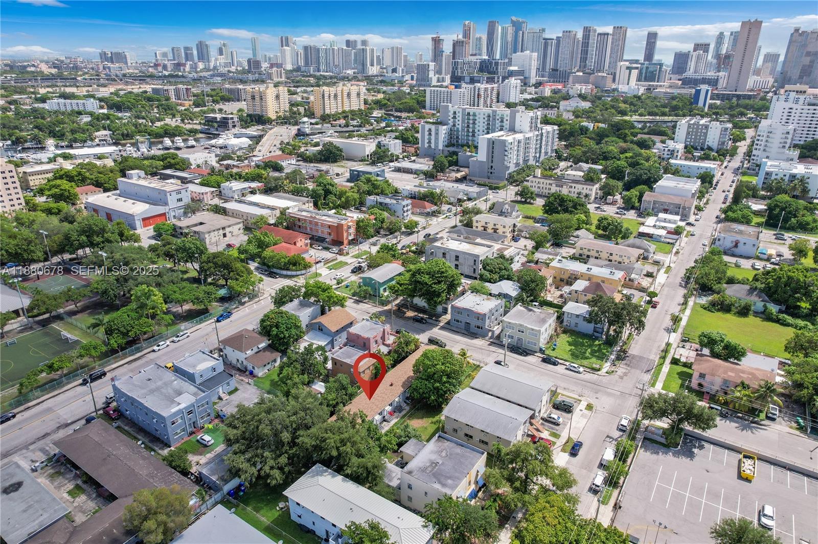 110 Northwest 9th Avenue, Unit 3 Miami, FL 33128 - Photo 8 of 9 an aerial view of residential houses with city view