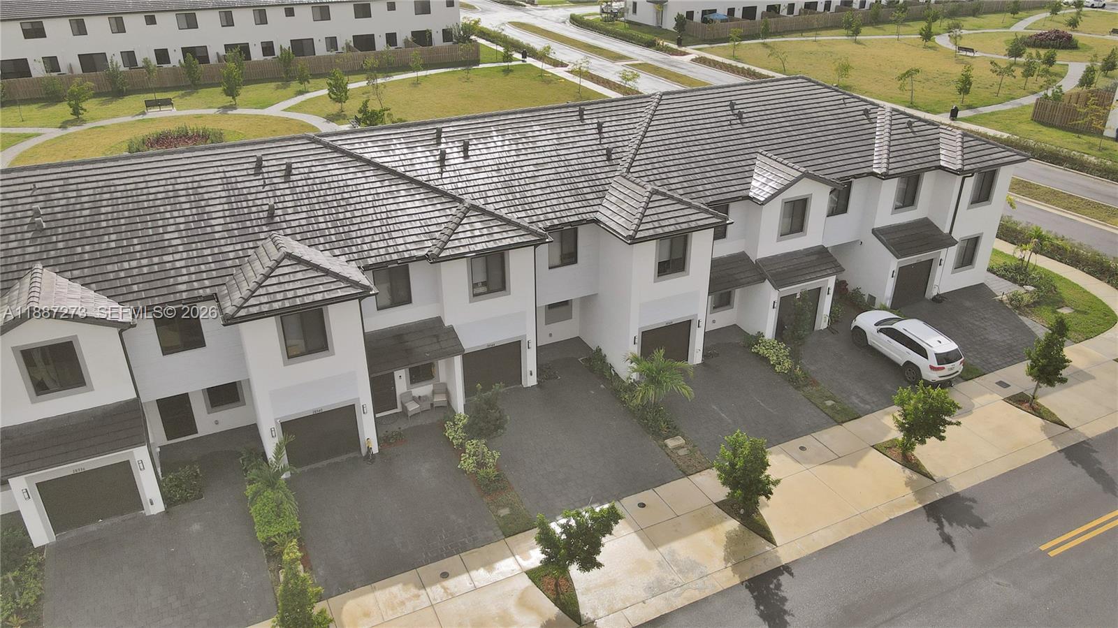 18944 Southwest 344th Terrace Homestead, FL 33034 - Photo 44 of 58 an aerial view of residential houses with outdoor space
