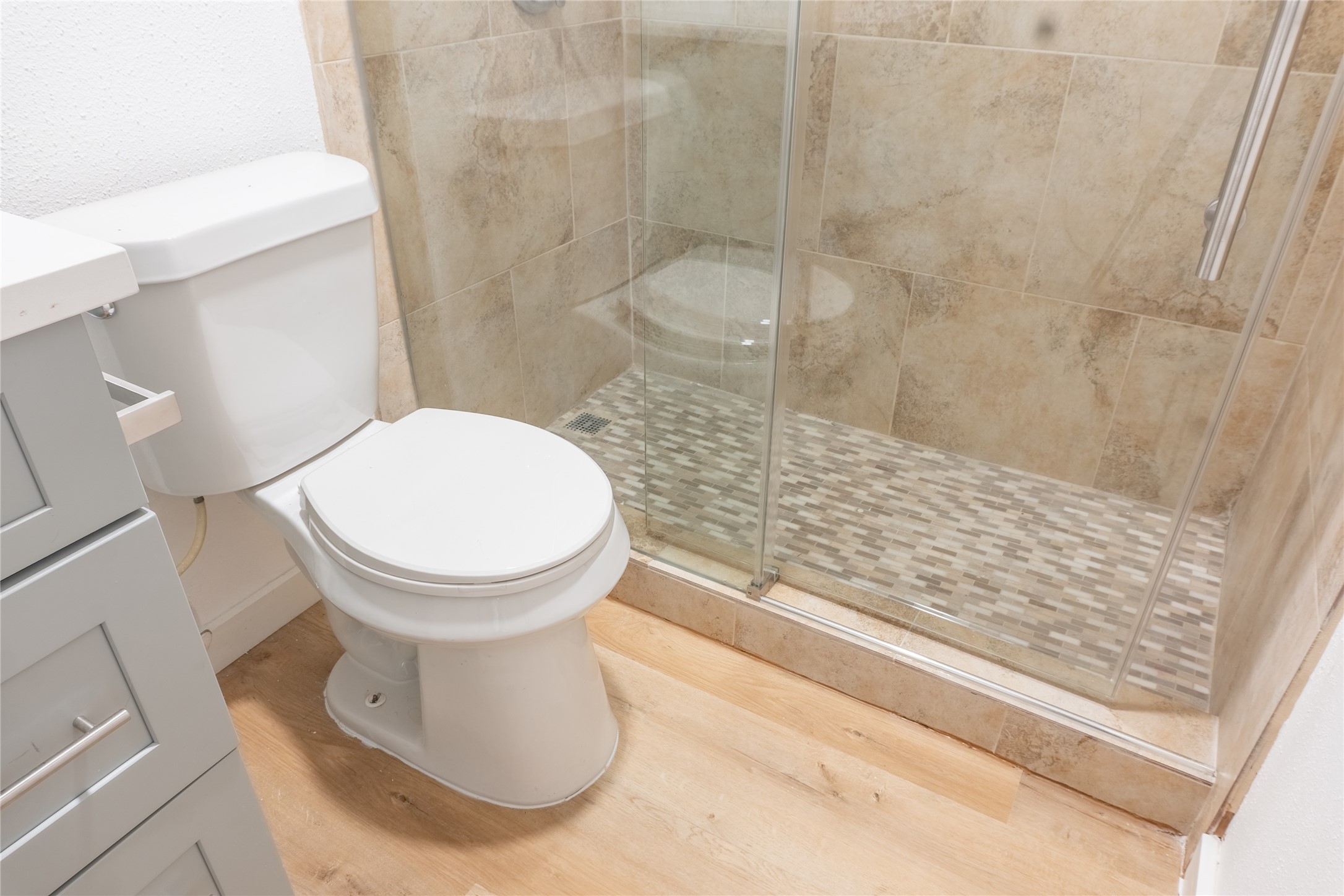 3919 Fairmont Parkway, Unit 129 Pasadena, TX 77504 - Photo 11 of 18 a bathroom with a toilet and a shower