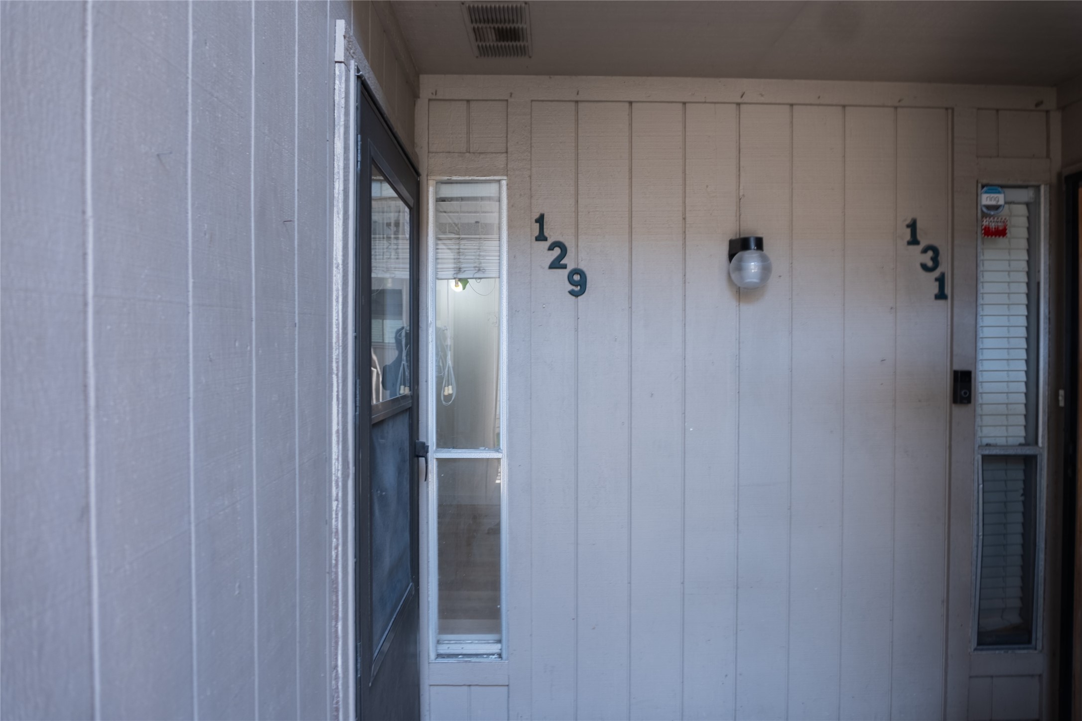 3919 Fairmont Parkway, Unit 129 Pasadena, TX 77504 - Photo 16 of 18 a bathroom with a shower and a door