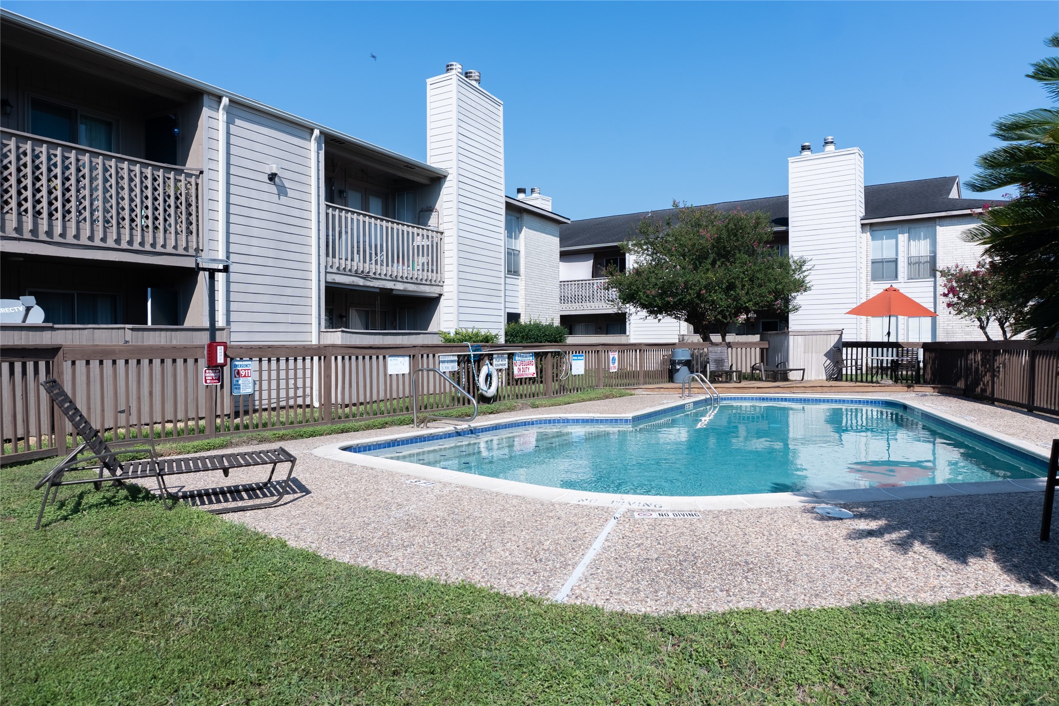 3919 Fairmont Parkway, Unit 129 Pasadena, TX 77504 - Photo 18 of 18 a view of a house with backyard and sitting area