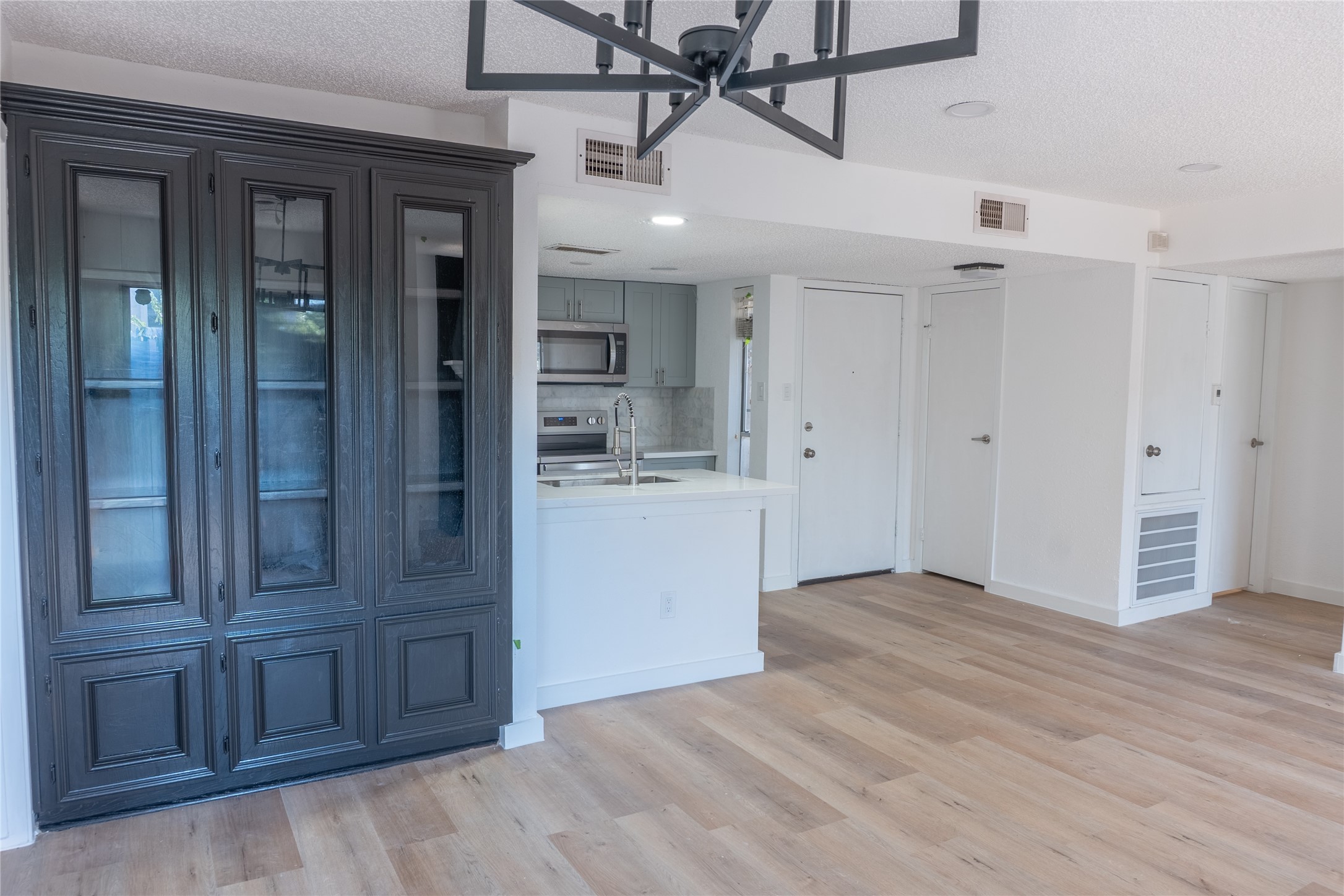 3919 Fairmont Parkway, Unit 129 Pasadena, TX 77504 - Photo 2 of 18 a view of a hallway with closet area