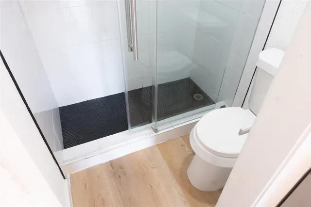 a bathroom with a toilet and a sink