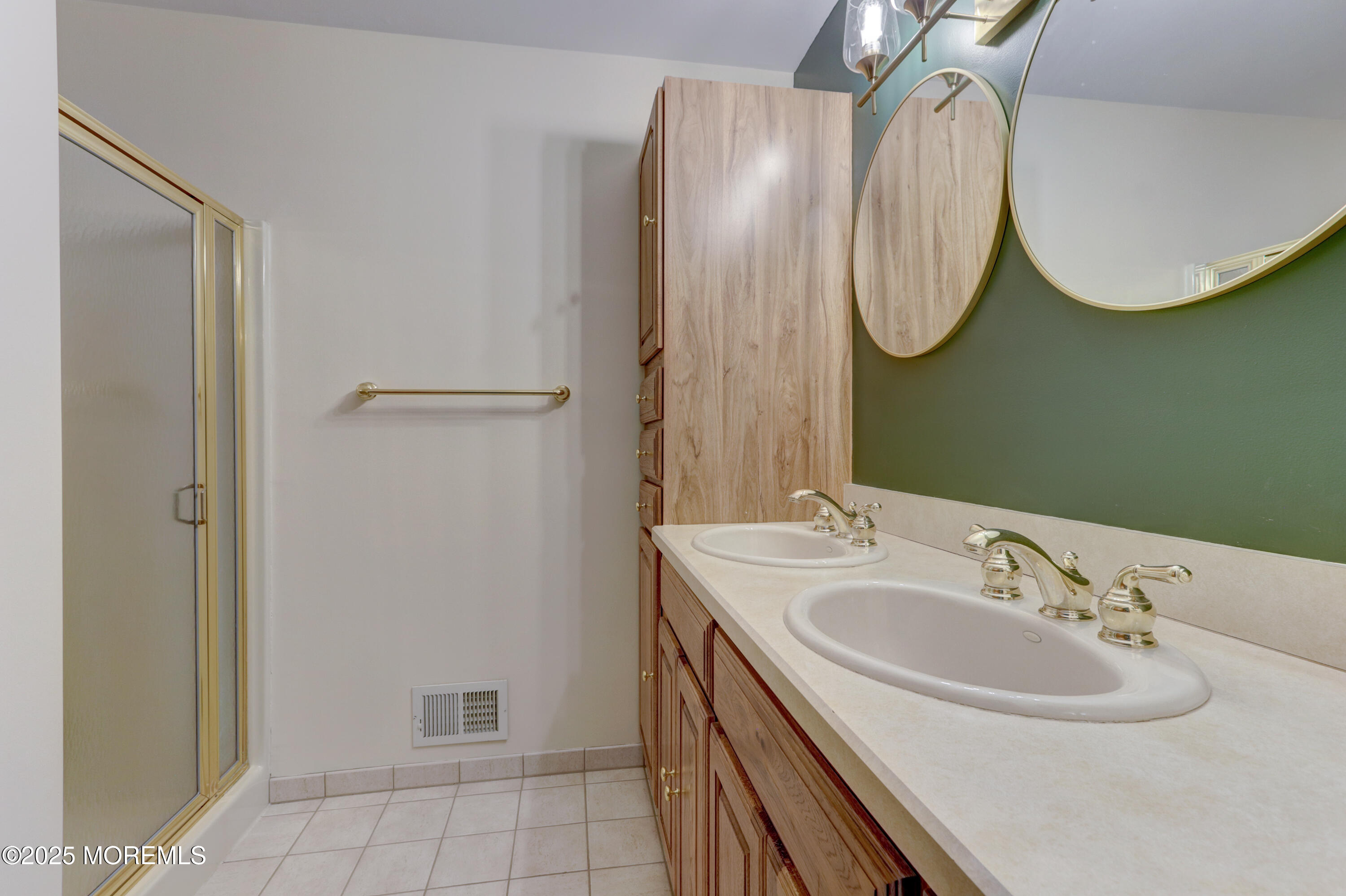 143 Siloam Road Freehold, NJ 07728 - Photo 24 of 55 a bathroom with a sink and a mirror