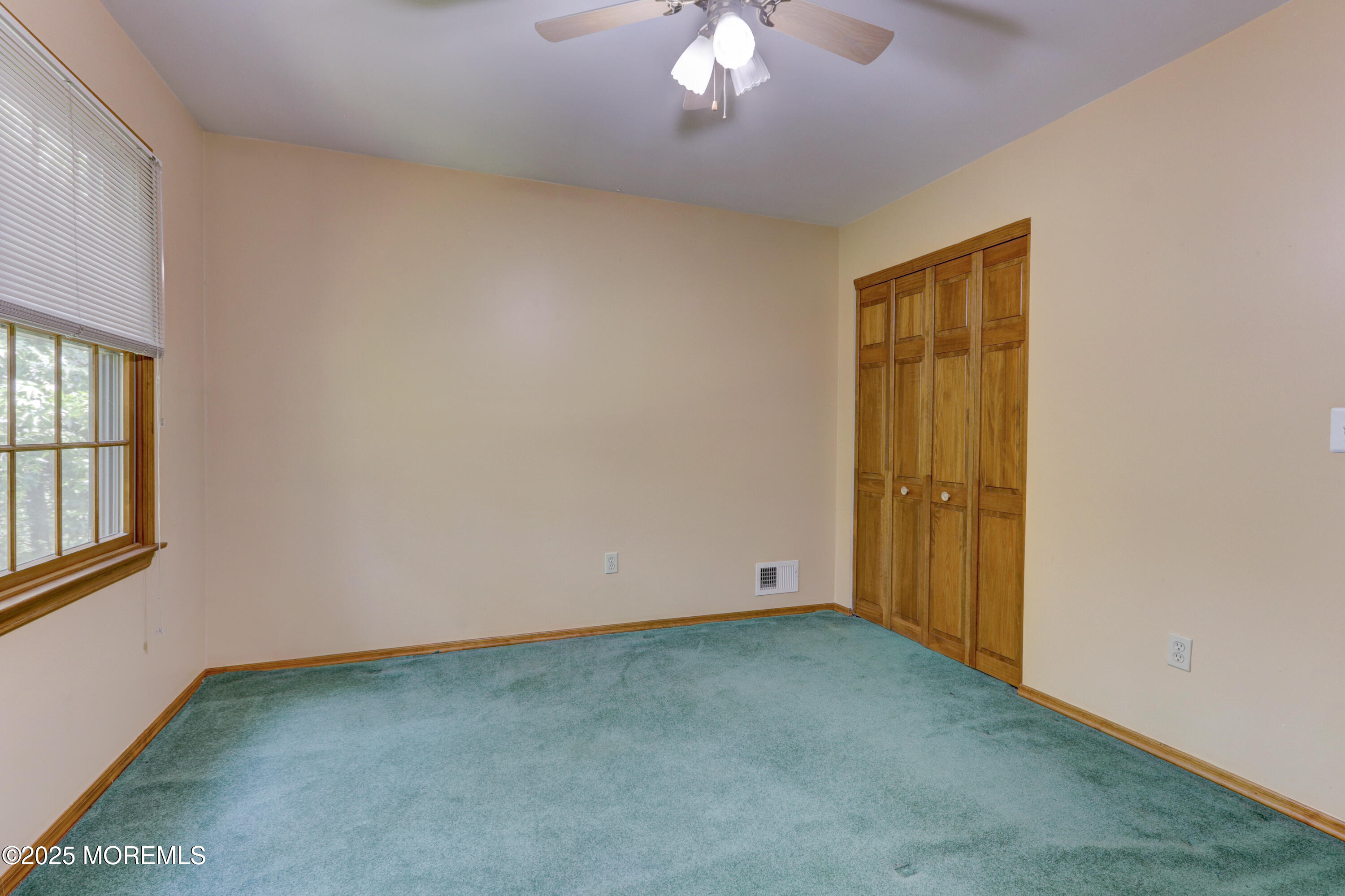 143 Siloam Road Freehold, NJ 07728 - Photo 26 of 55 an empty room with a empty space and windows