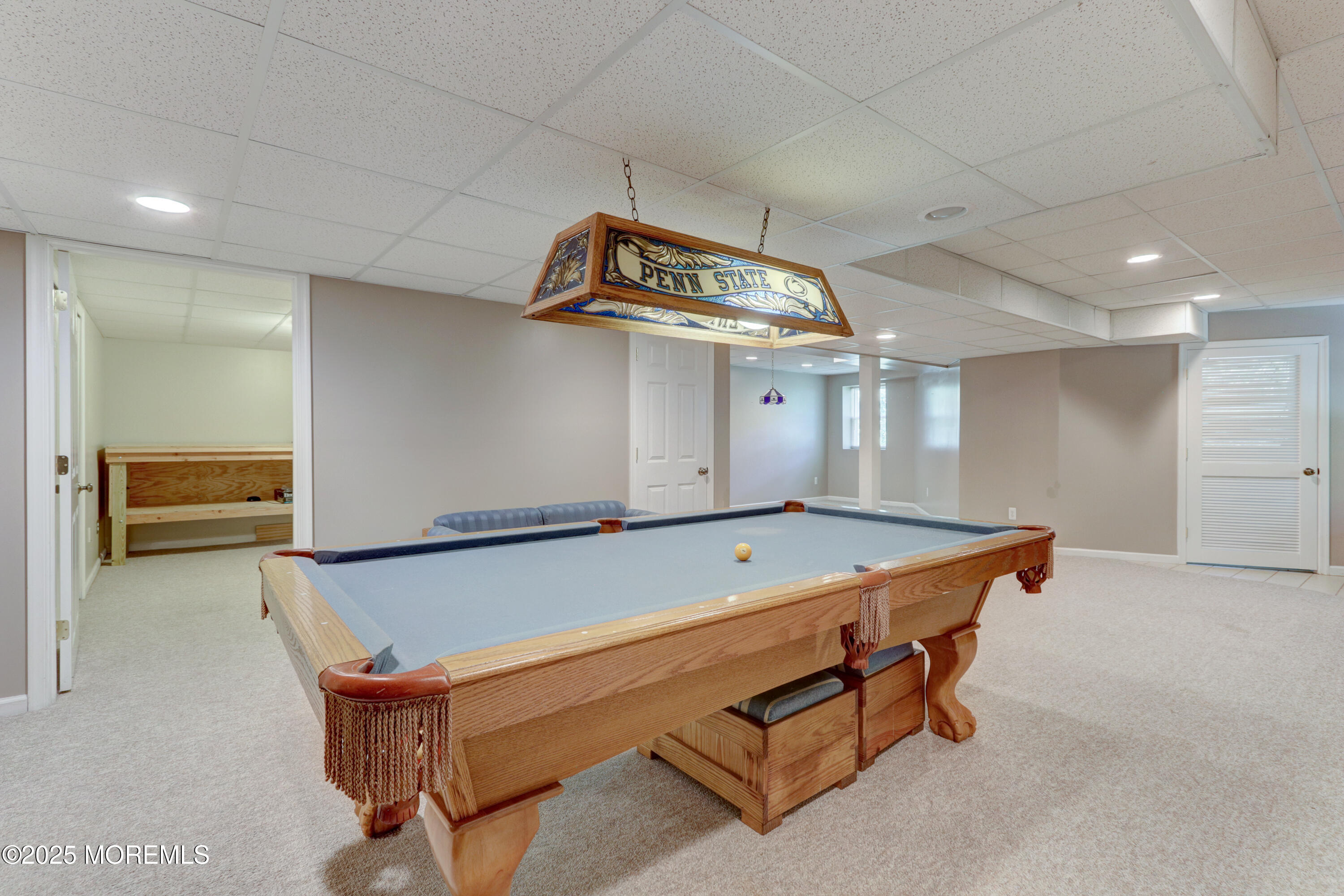 143 Siloam Road Freehold, NJ 07728 - Photo 36 of 55 a room with wooden floor and furniture