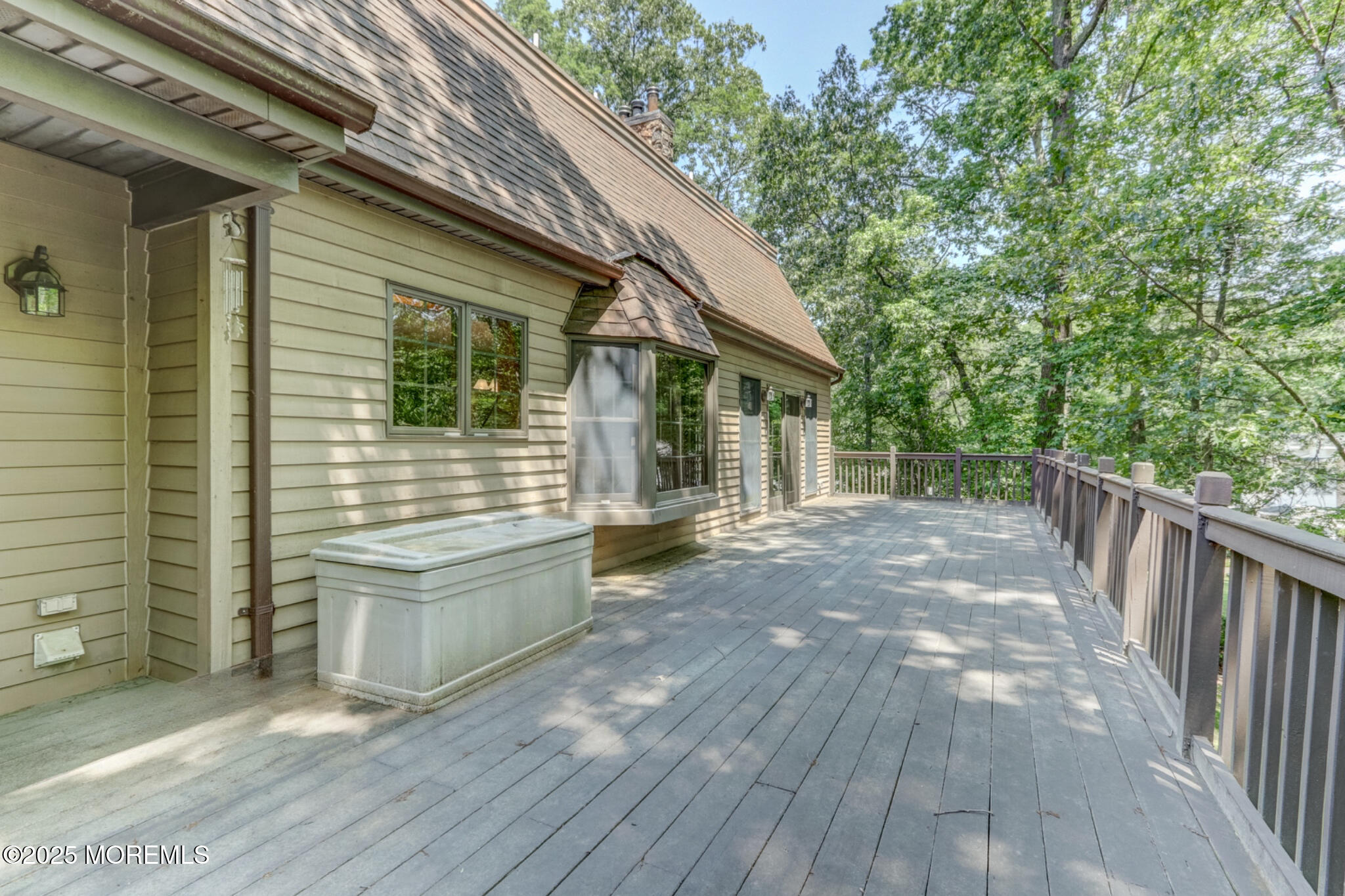 143 Siloam Road Freehold, NJ 07728 - Photo 42 of 55 a view of backyard with small cabin and wooden fencing
