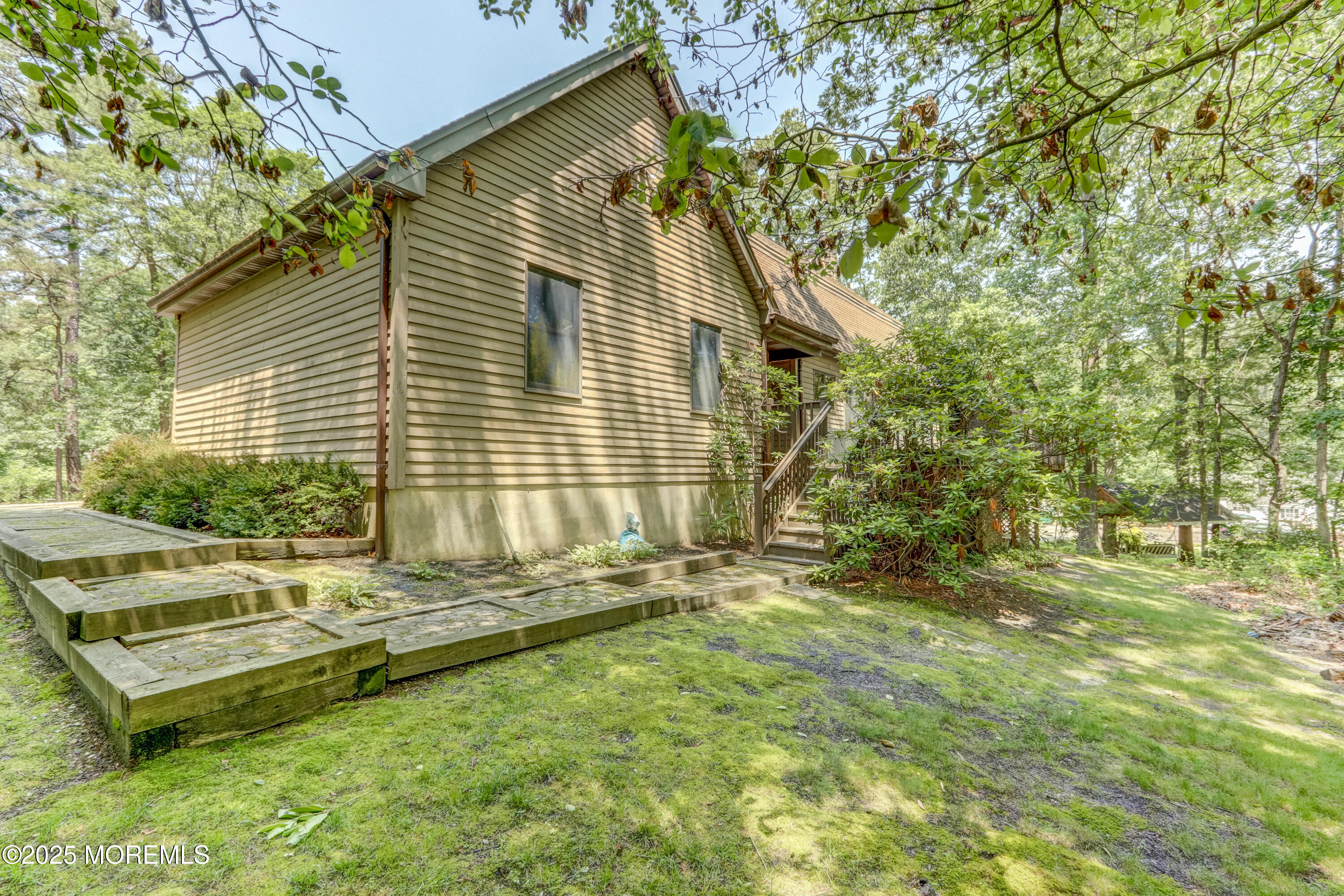143 Siloam Road Freehold, NJ 07728 - Photo 44 of 55 a view of a house with a backyard and sitting area