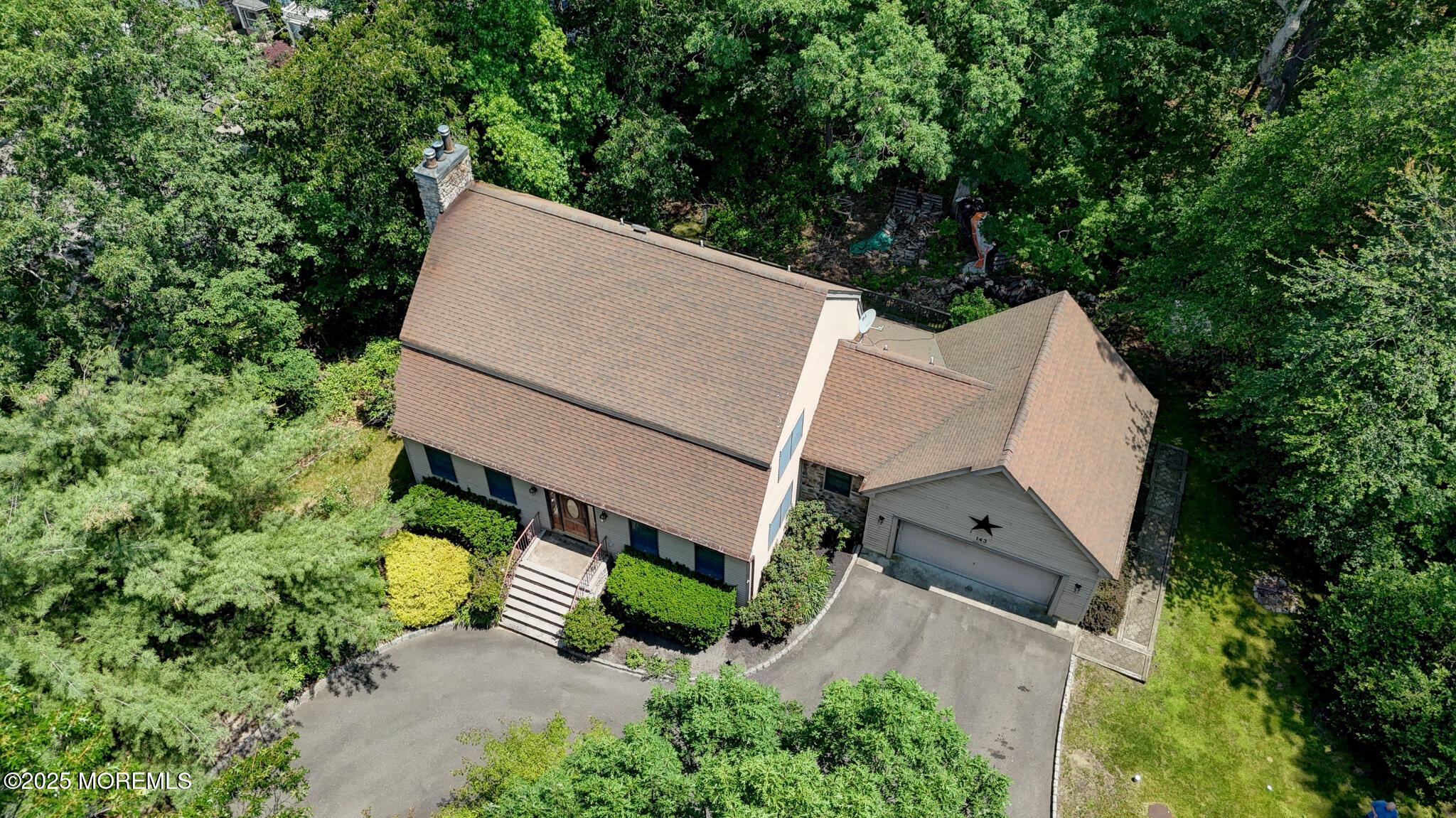 143 Siloam Road Freehold, NJ 07728 - Photo 47 of 55 an aerial view of a house with outdoor space and sitting area